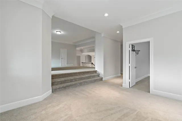 a view of entryway and hall with a cabinet