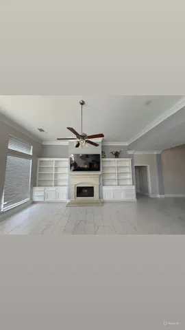 a view of a livingroom with a fireplace