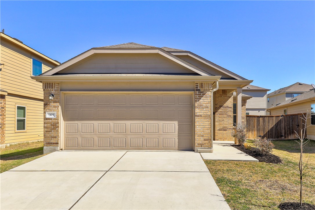 305 Circle Way, Unit 23C Jarrell, TX 76537 - Photo 1 of 1 a front view of a house with a shower