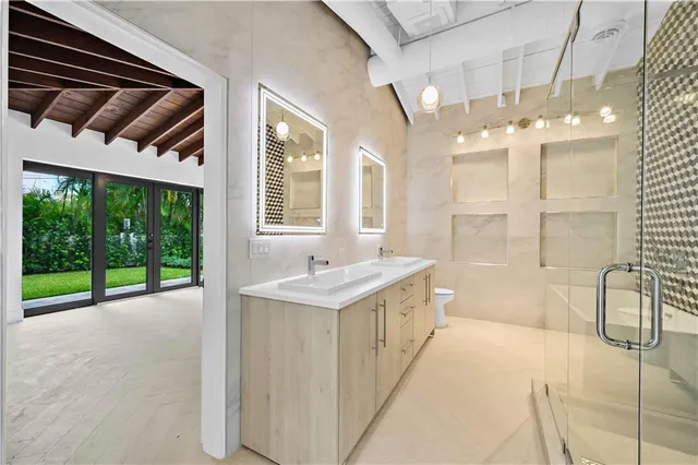 a view of a room with wooden walls