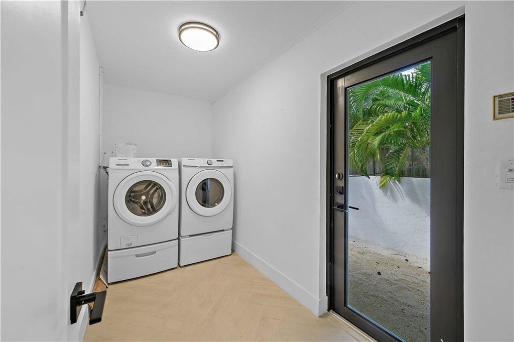 2201 Intracoastal Drive Fort Lauderdale, FL 33305 - Photo 20 of 35 a utility room with dryer and washer