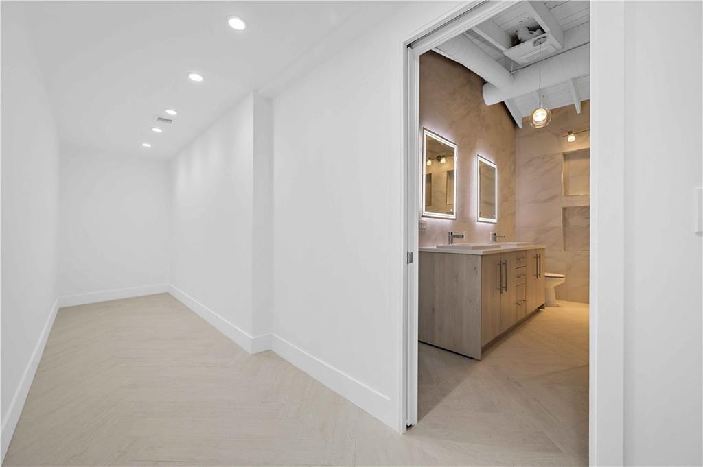 2201 Intracoastal Drive Fort Lauderdale, FL 33305 - Photo 21 of 35 a view of a kitchen cabinets and a utility room