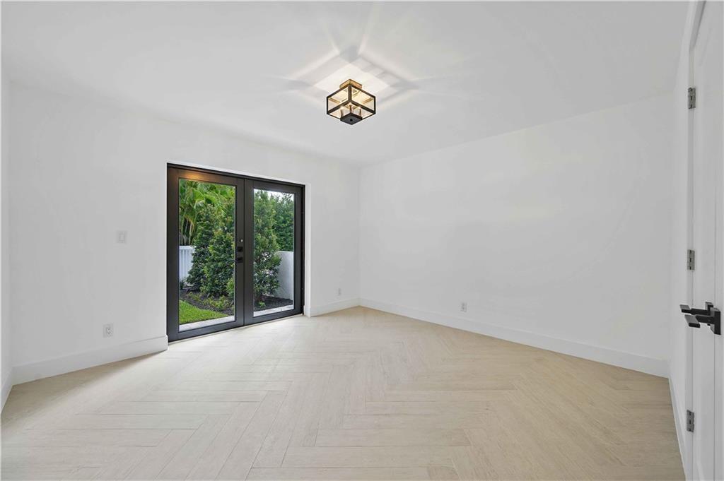 2201 Intracoastal Drive Fort Lauderdale, FL 33305 - Photo 22 of 35 a view of an empty room with a window