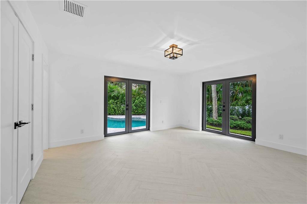 2201 Intracoastal Drive Fort Lauderdale, FL 33305 - Photo 24 of 35 an empty room with windows