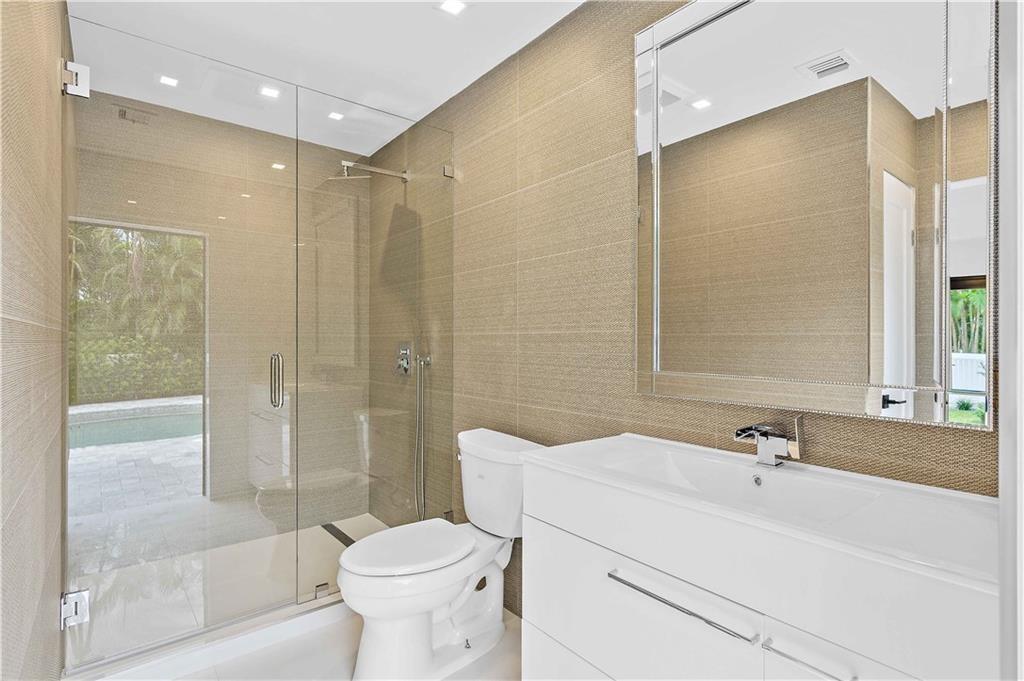 2201 Intracoastal Drive Fort Lauderdale, FL 33305 - Photo 25 of 35 a bathroom with a sink toilet and shower