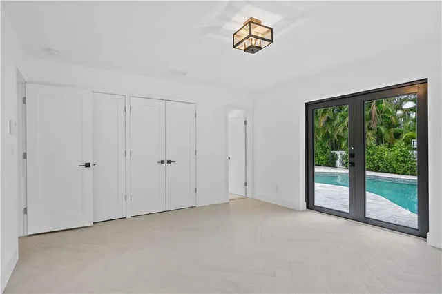 a bathroom with a double vanity sink toilet and shower