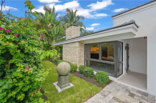 a view of a backyard of a house