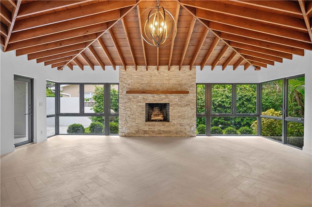 2201 Intracoastal Drive Fort Lauderdale, FL 33305 - Photo 7 of 35 a view of an empty room with a fireplace and window