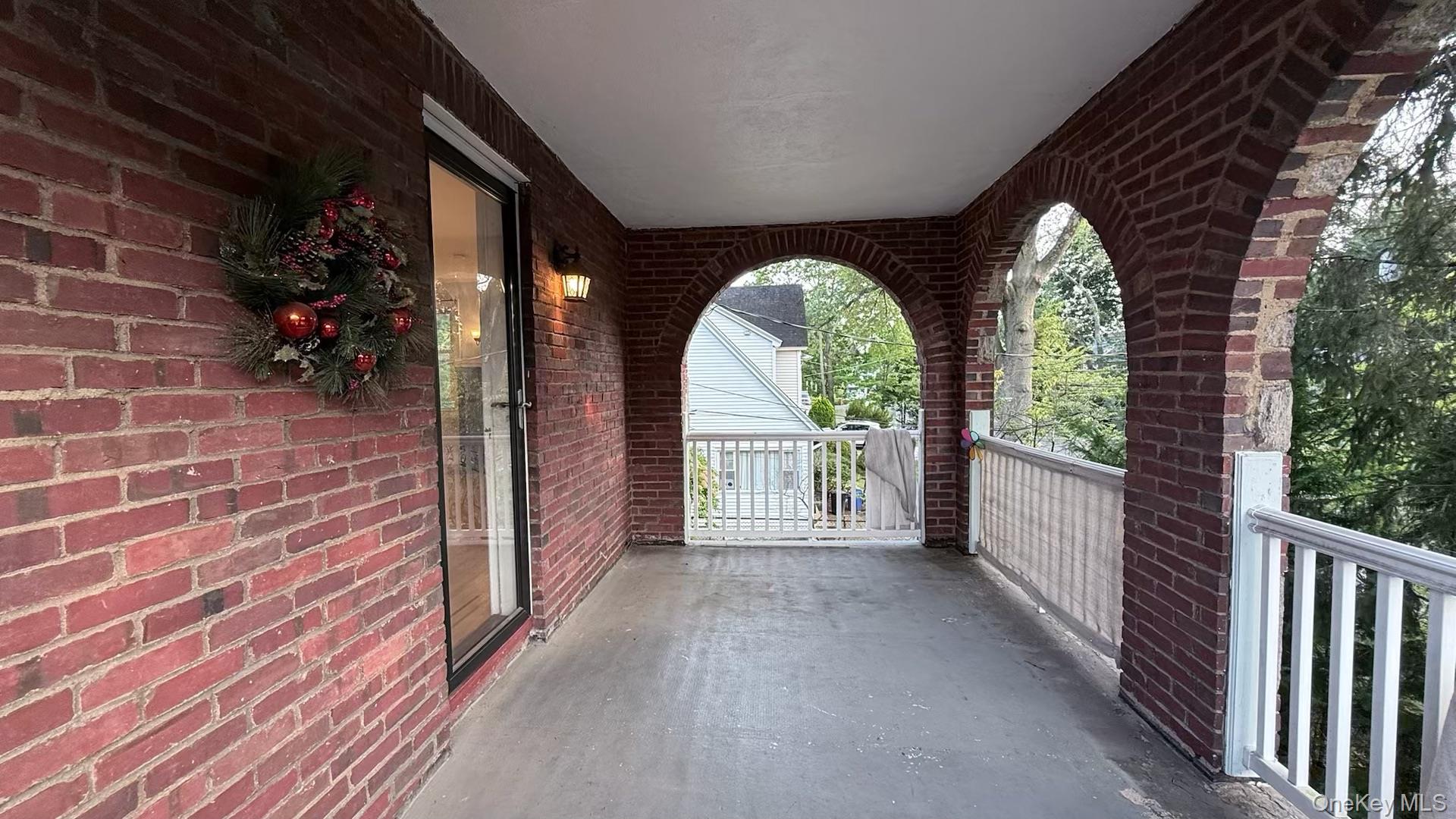 15 Prospect Street, Unit 2 Great Neck, NY 11021 - Photo 8 of 11 a view of a garden from a balcony