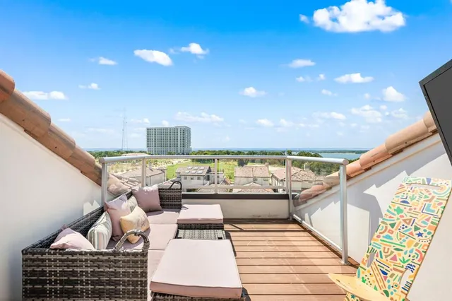 a view of swimming pool with outdoor seating