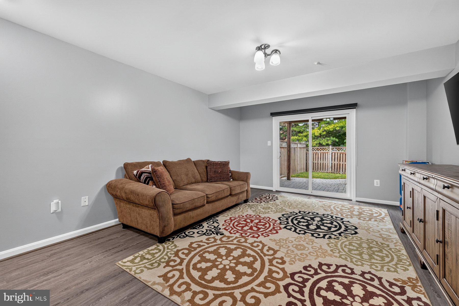 2414 Rippling Brook Road Frederick, MD 21701 - Photo 33 of 50 Lower level rec room, opens to rear yard