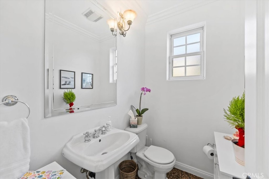 1020 Harbor Crossing Lane Marina del Rey, CA 90292 - Photo 35 of 54 a bathroom with a sink toilet and a mirror