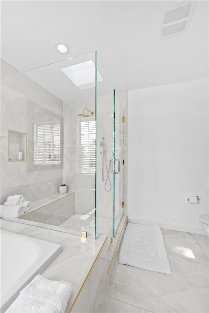 1020 Harbor Crossing Lane Marina del Rey, CA 90292 - Photo 36 of 54 a spacious bathroom with a tub shower and sink