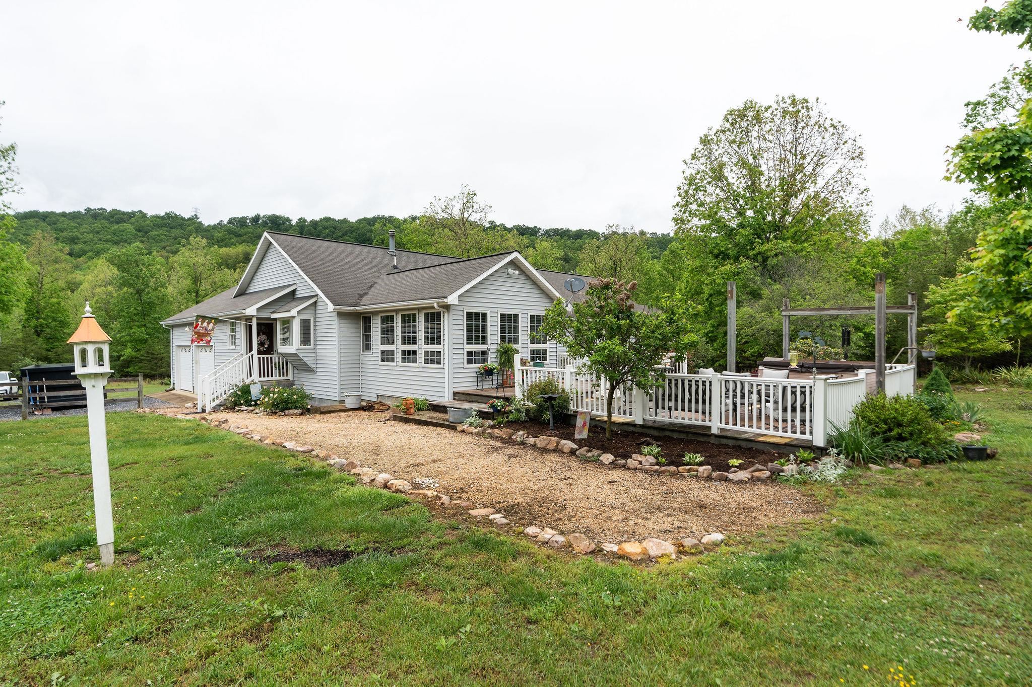 516 Estaline Valley Road Craigsville, VA 24430 - Photo 3 of 75 a house with green field in front of it