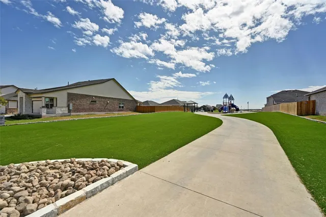 a view of outdoor space and yard