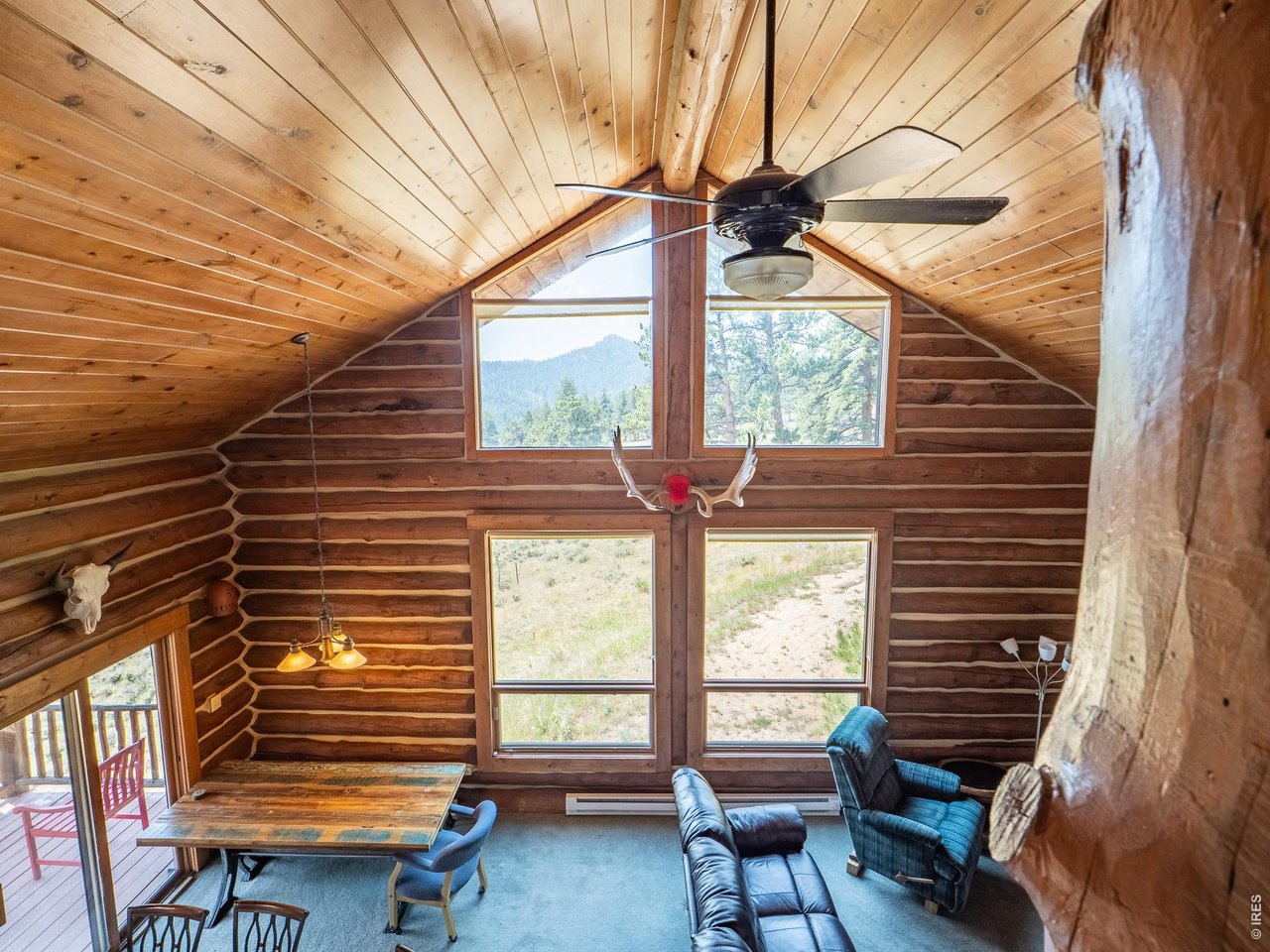 296 Caddo Road Red Feather Lakes, CO 80545 - Photo 19 of 50 Great room view from the loft nook.