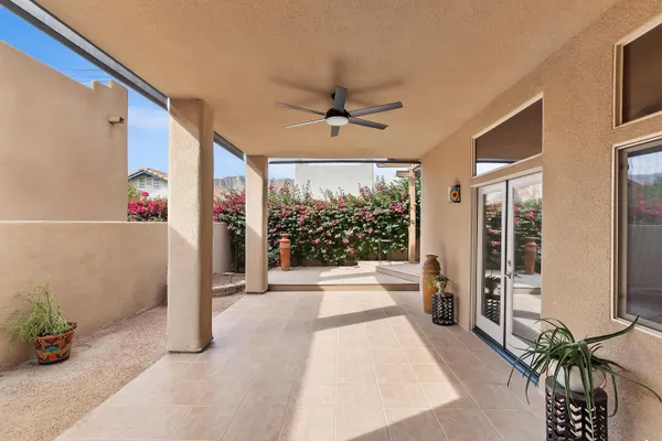 a view of a house with wooden floor and sitting area
