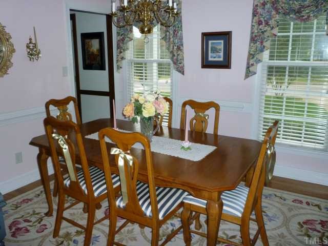 6424 Wynbrook Way Raleigh, NC 27612 - Photo 5 of 12 a view of a dining room with furniture and window