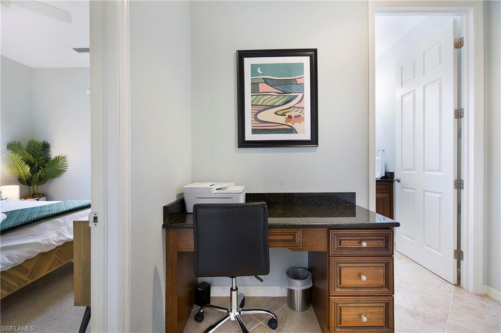 8975 Malibu Street, Unit 1304 Naples, FL 34113 - Photo 13 of 43 a view of workspace with cabinets