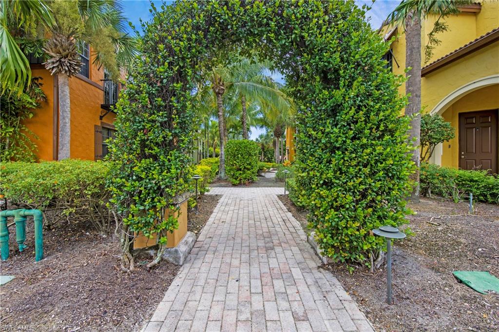 8975 Malibu Street, Unit 1304 Naples, FL 34113 - Photo 27 of 43 a view of a pathway with plants