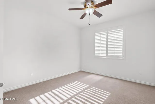 a bathroom with a shower a toilet and a bathtub
