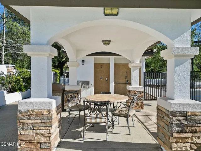 a view of a terrace with a yard