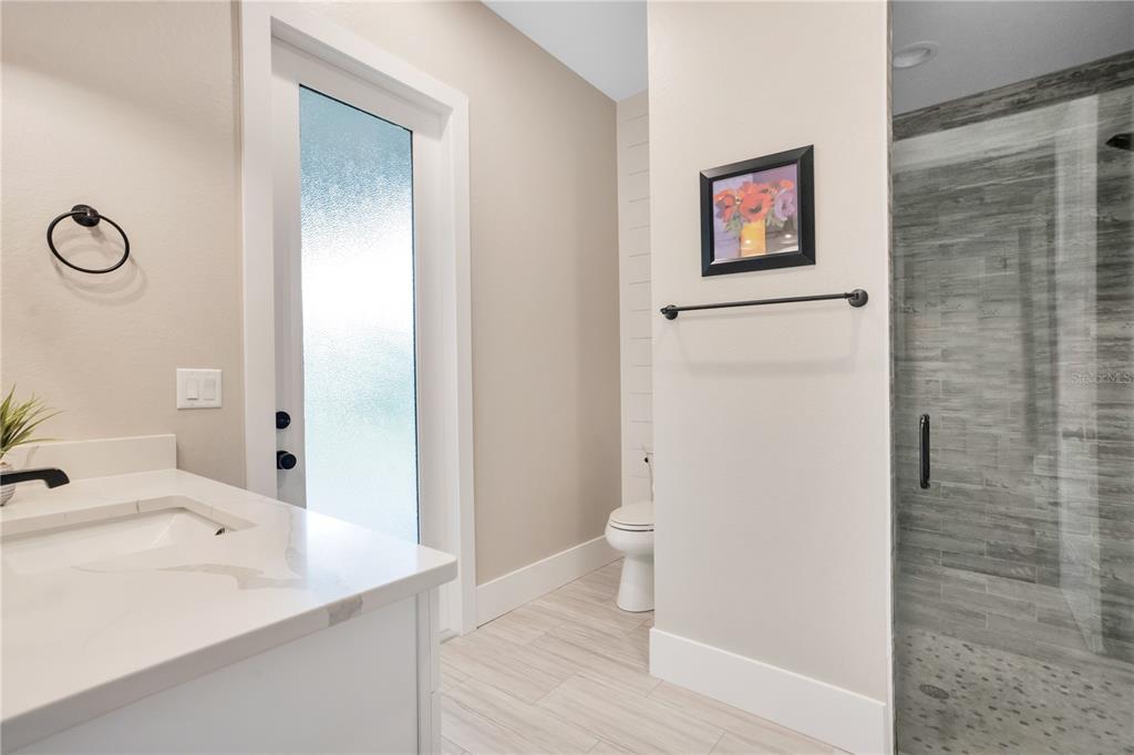440 Palma Ceia Road Winter Haven, FL 33884 - Photo 39 of 78 a bathroom with a sink and a mirror