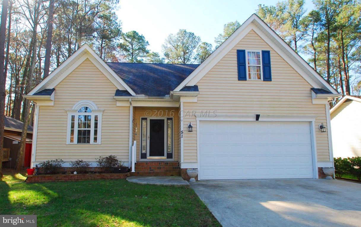 51 Pinehurst Road Ocean Pines, MD 21811 - Photo 1 of 50 a front view of a house with a yard