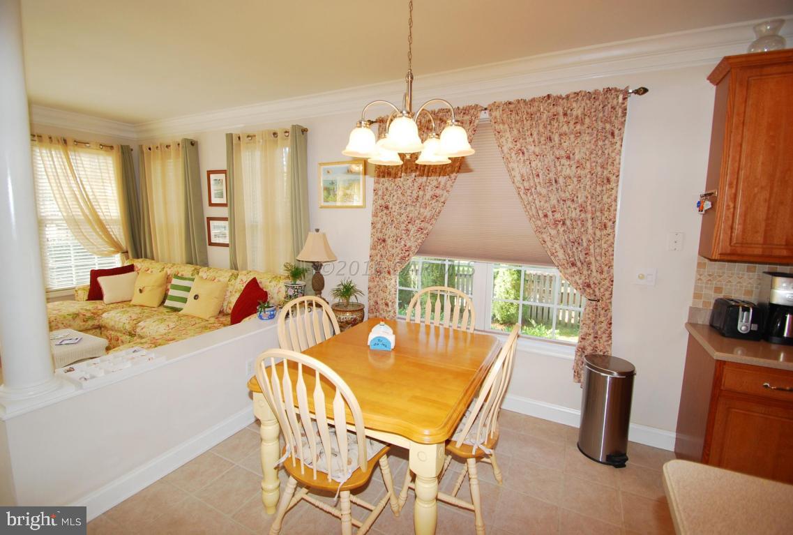 51 Pinehurst Road Ocean Pines, MD 21811 - Photo 16 of 50 a dining room with furniture and window
