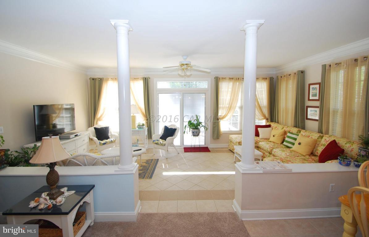 51 Pinehurst Road Ocean Pines, MD 21811 - Photo 18 of 50 a living room with furniture and a flat screen tv