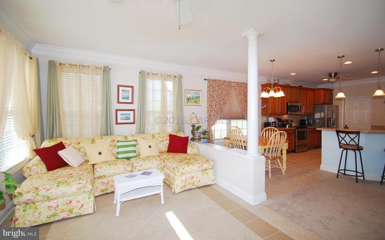 51 Pinehurst Road Ocean Pines, MD 21811 - Photo 19 of 50 a living room with furniture and a large window