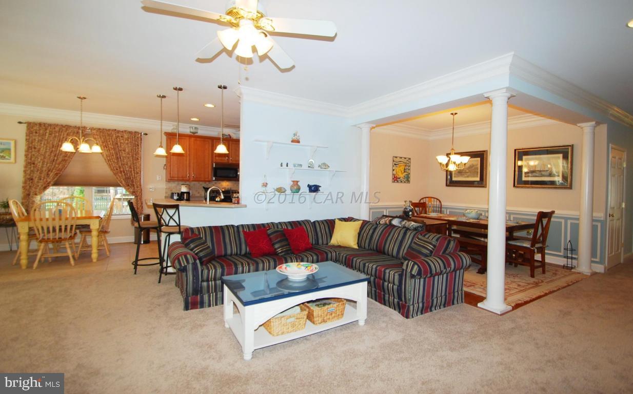 51 Pinehurst Road Ocean Pines, MD 21811 - Photo 3 of 50 a living room with furniture a chandelier and a view of living room