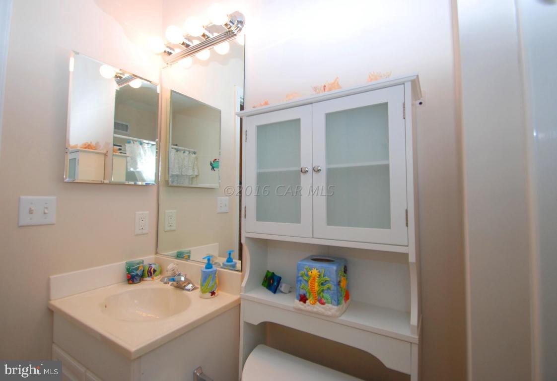 51 Pinehurst Road Ocean Pines, MD 21811 - Photo 40 of 50 a bathroom with a sink and mirror