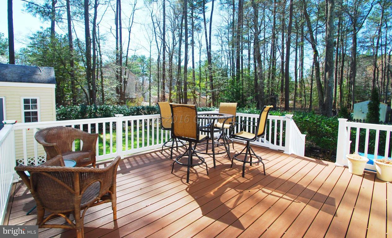 51 Pinehurst Road Ocean Pines, MD 21811 - Photo 42 of 50 a view of a chairs and table on the wooden floor