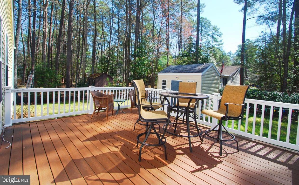 51 Pinehurst Road Ocean Pines, MD 21811 - Photo 44 of 50 a view of a chairs and table on the wooden floor