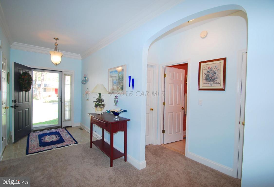 51 Pinehurst Road Ocean Pines, MD 21811 - Photo 45 of 50 a room with furniture and window