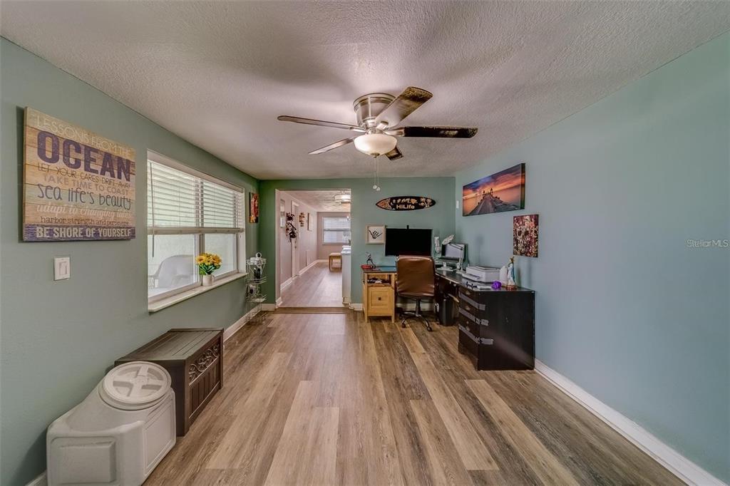 2646 Albion Street Holiday, FL 34691 - Photo 18 of 64 a living room with furniture and a flat screen tv