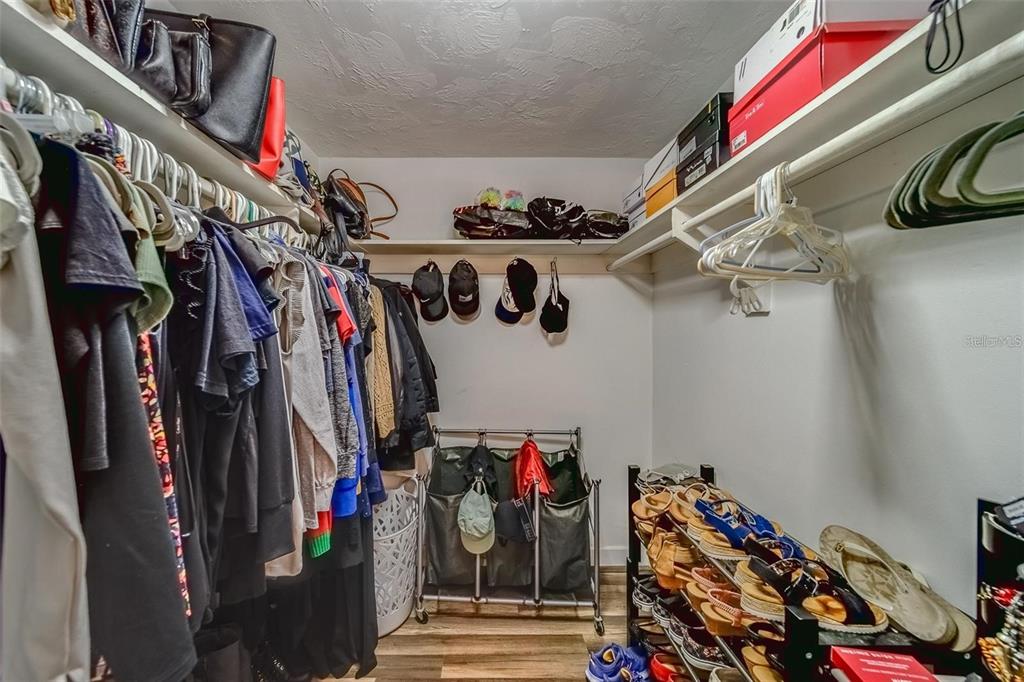2646 Albion Street Holiday, FL 34691 - Photo 22 of 64 a view of walk in closet with clothes