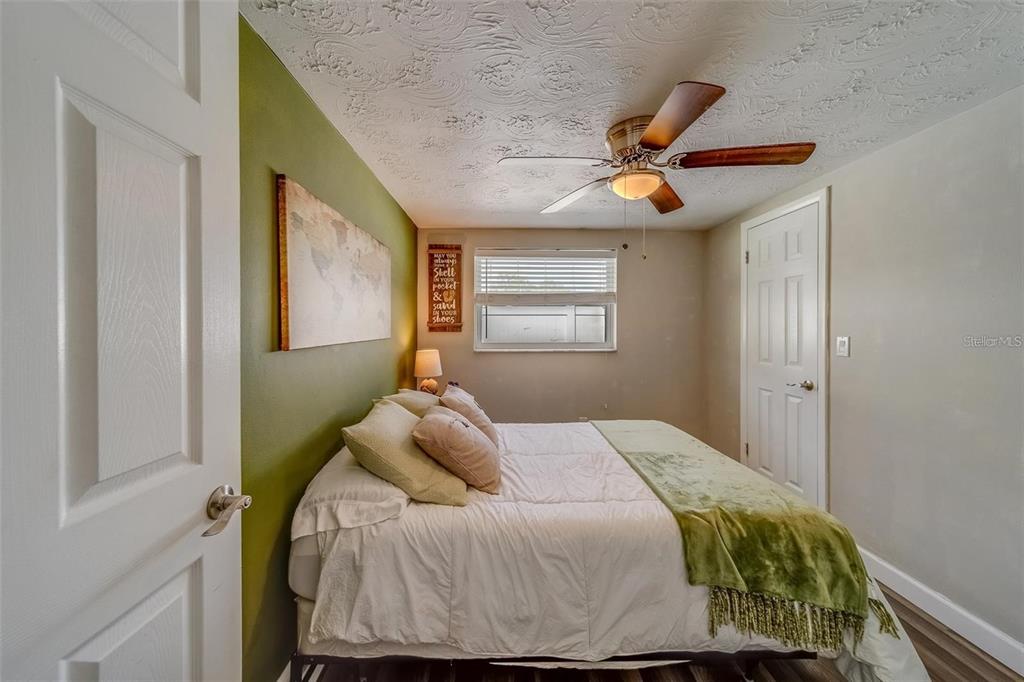 2646 Albion Street Holiday, FL 34691 - Photo 28 of 64 a bedroom with a bed and window