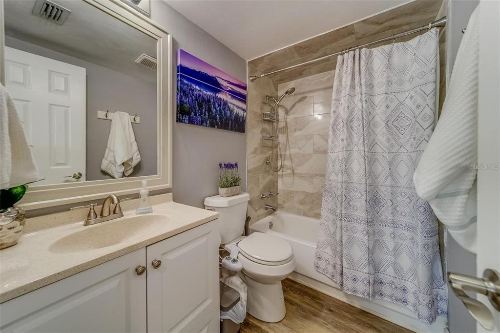 2646 Albion Street Holiday, FL 34691 - Photo 34 of 64 a bathroom with a sink and a mirror