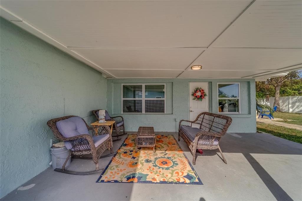 2646 Albion Street Holiday, FL 34691 - Photo 36 of 64 a living room with furniture and a large window