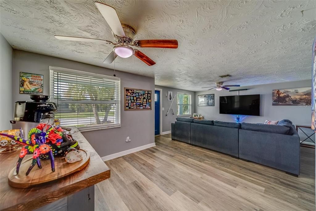 2646 Albion Street Holiday, FL 34691 - Photo 4 of 64 a living room with furniture and flat screen tv