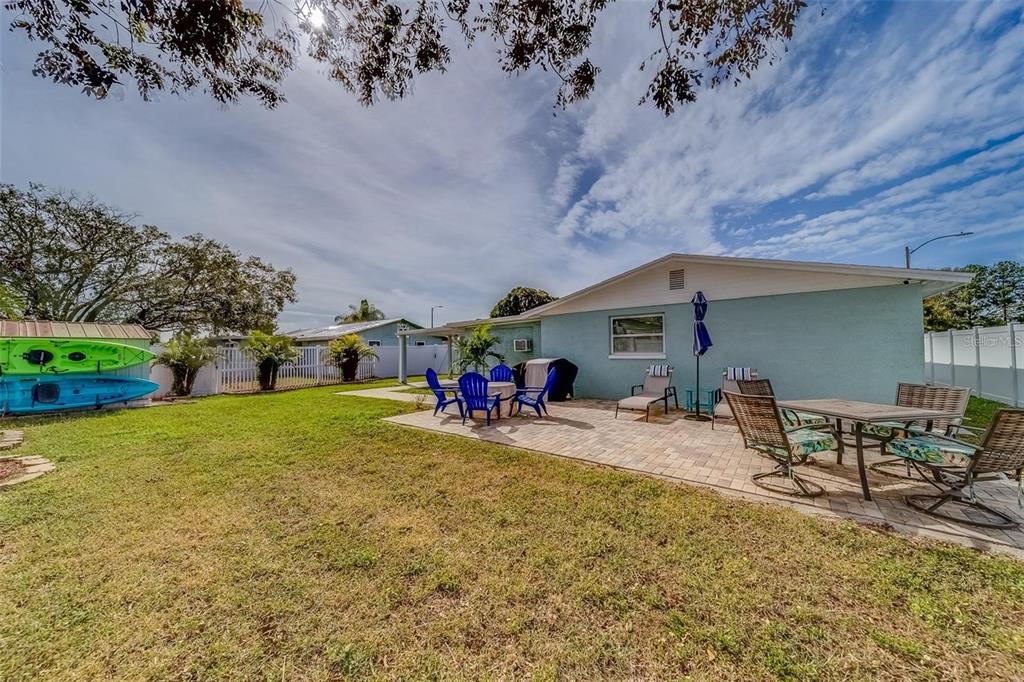 2646 Albion Street Holiday, FL 34691 - Photo 44 of 64 a view of a house with backyard and sitting area