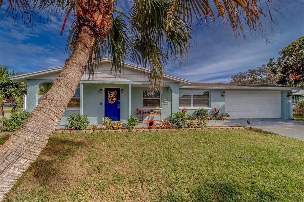 2646 Albion Street Holiday, FL 34691 - Photo 51 of 64 front view of house with a small yard