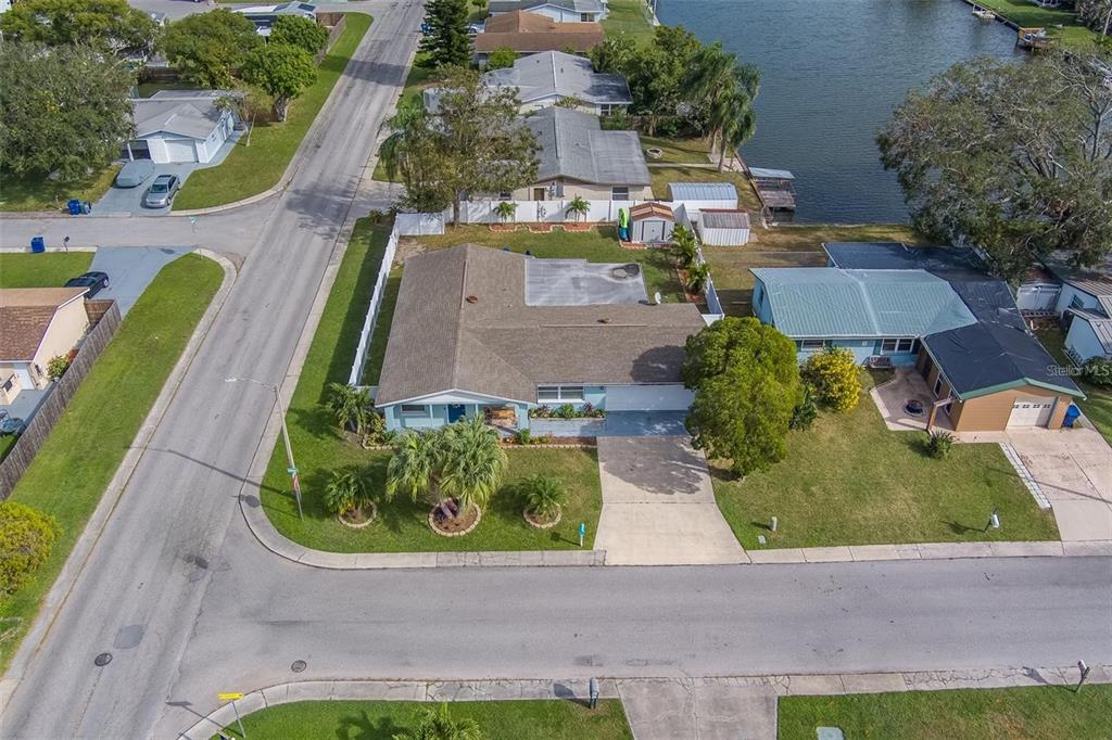 2646 Albion Street Holiday, FL 34691 - Photo 56 of 64 an aerial view of a house with garden space and street view