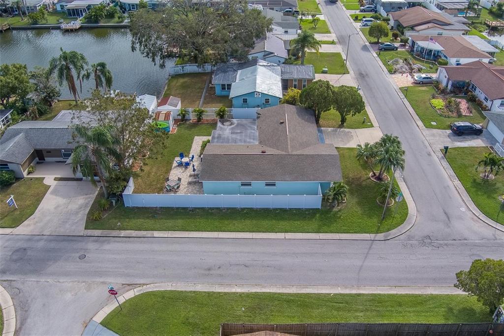 2646 Albion Street Holiday, FL 34691 - Photo 60 of 64 an aerial view of a house with outdoor space and lake view