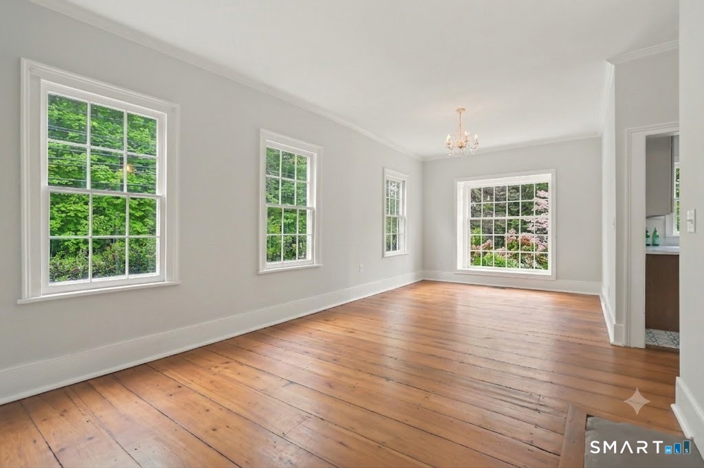 530 Roxbury Road Stamford, CT 06902 - Photo 7 of 40 Ten foot ceilings and lots of windows flood the room with morning light