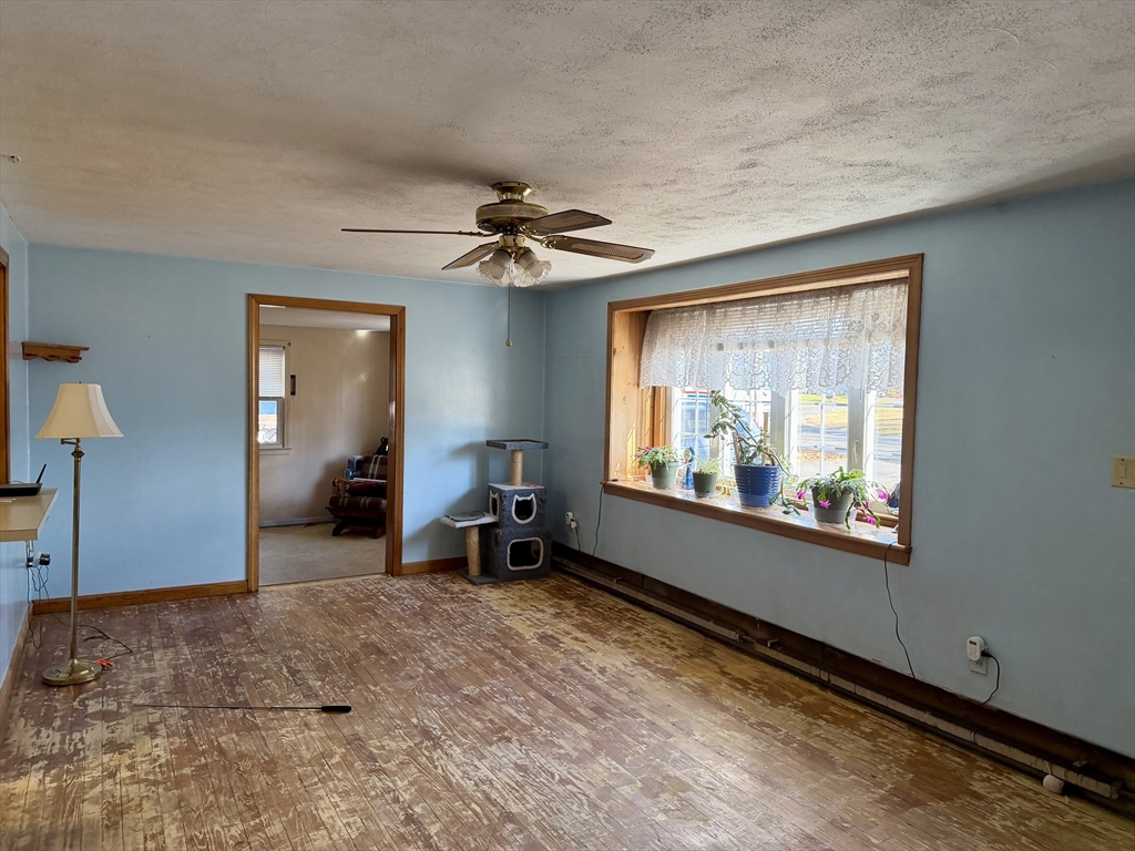 31 Pineywood Road Southwick, MA 01077 - Photo 6 of 12 a living room with furniture and a large window