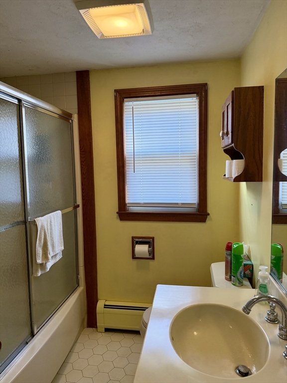 31 Pineywood Road Southwick, MA 01077 - Photo 7 of 12 a bathroom with a sink and a mirror
