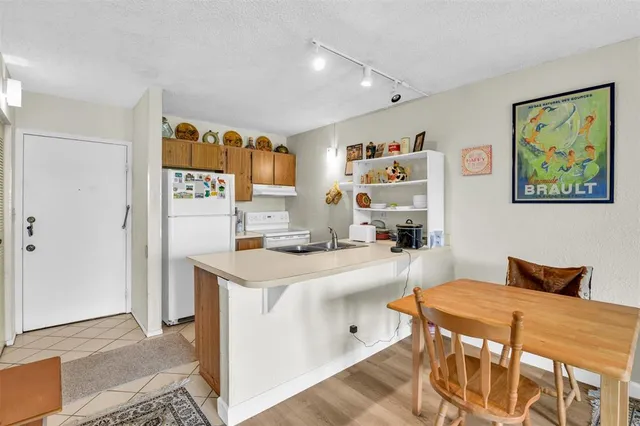 a bedroom with a bed and a cabinets